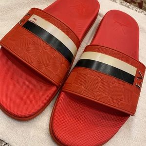 Red Louis Vuitton slides